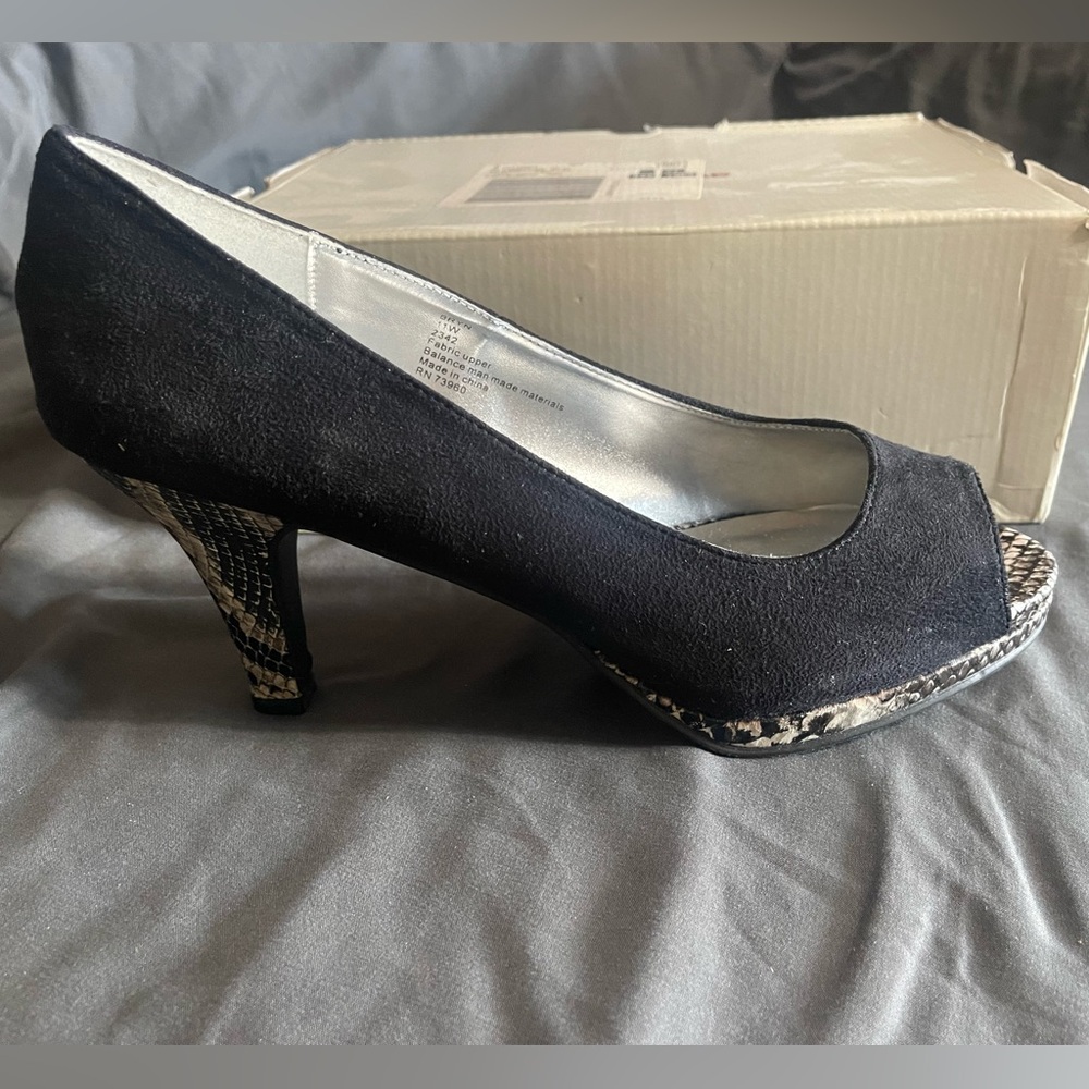 Brand new. Never worn black faux suede pumps with crocodile platform and heel.